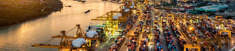 GettyImages-996270738_Aerial%20view%20of%20international%20port%20with%20Crane%20loading%20containers%20CARD_0