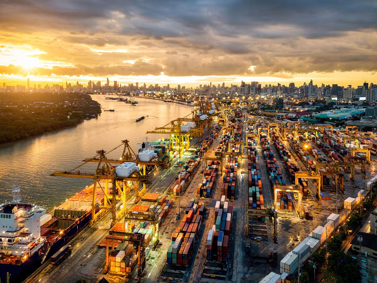 Aerial view of international port with Crane loading containers
