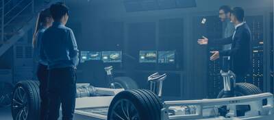 GettyImages-1162762116-four-people-working-around-the-base-of-a-car-HEADER-2400x1600