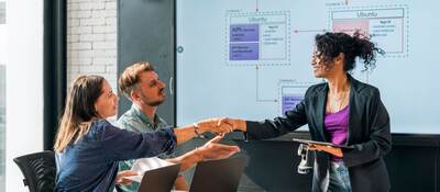 GettyImages-2160037733-people-shaking-hands-during-a-meeting-HEADER-2400x1600