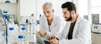 team-of-scientists-reviewing-findings-2194222776-HEADER-1200x900