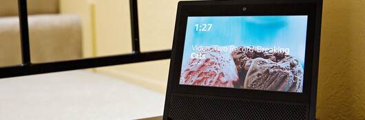 Tablet on a table presenting a video