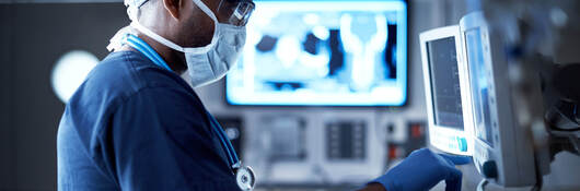 592647720-Surgeon-monitoring-vitals