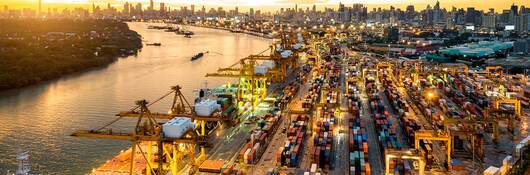 GettyImages-996270738_Aerial%20view%20of%20international%20port%20with%20Crane%20loading%20containers%20CARD_0