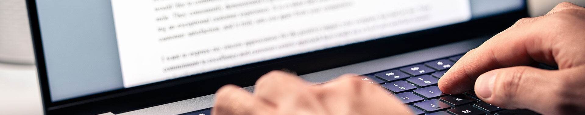 GettyImages-1795222044-person-typing-HEADER-1920x380